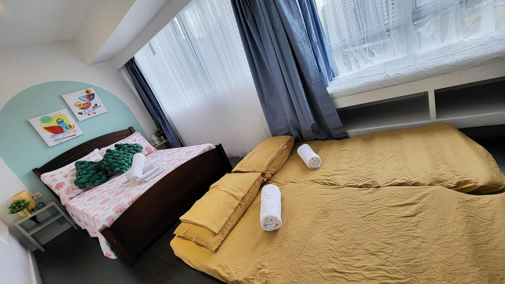 מנילה Muggle Stay Guest House - Bonifacio Global City Taguig חדר תמונה