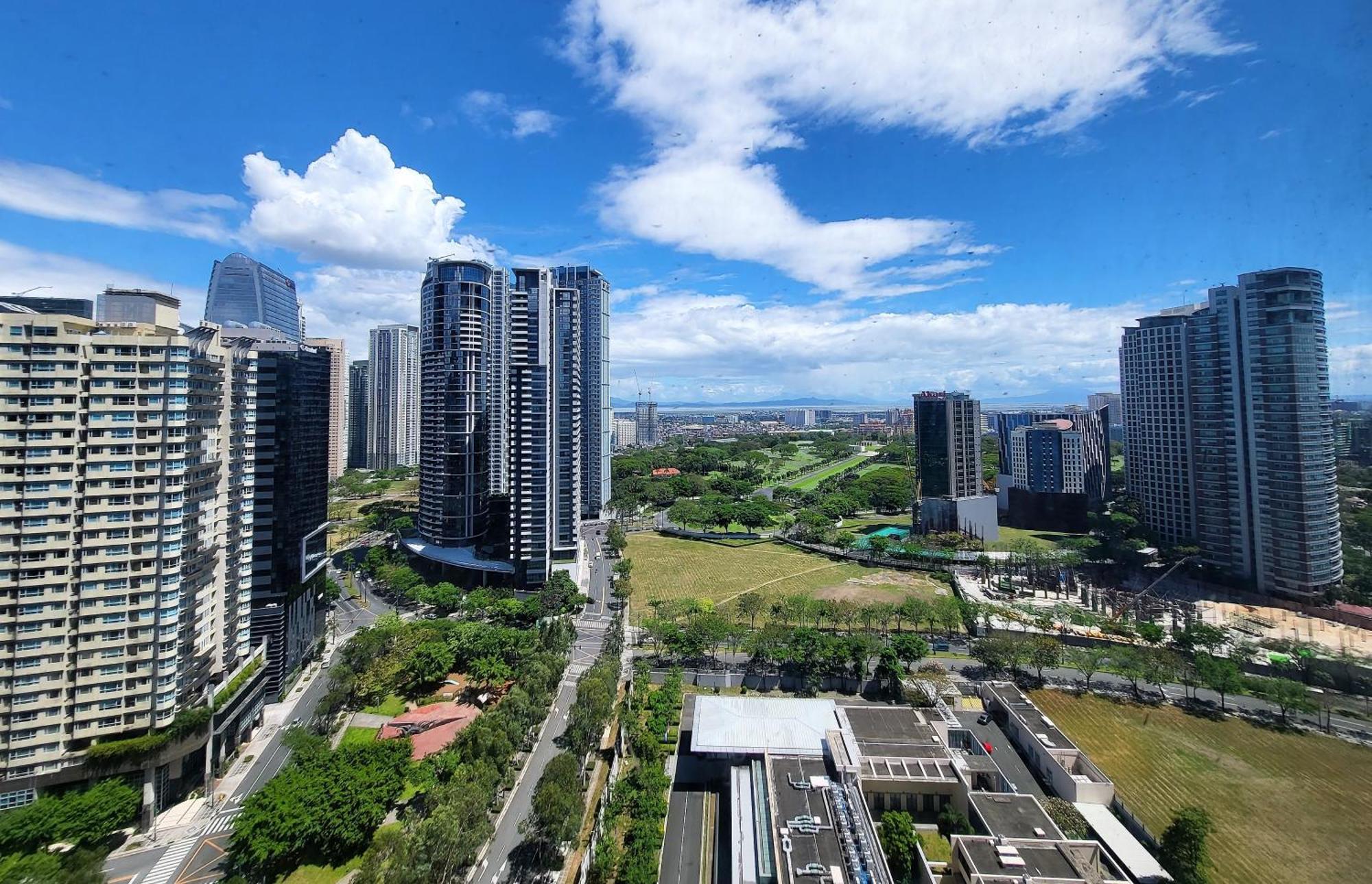 מנילה Muggle Stay Guest House - Bonifacio Global City Taguig חדר תמונה